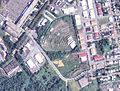 In this 2006 USGS airphoto, the defunct Boulevard Drive-In Theater can still be seen in a pie-shaped lot.