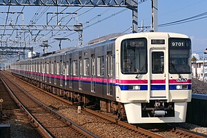 White train with pink and navy stripes