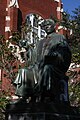 Statue of Albert Murphree with beer bottle placed in outstretched hand.