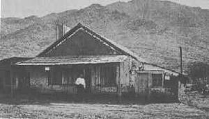 Chuck Stanton in front of his store.