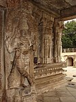 Dwarapalaka (door keeper) and a profile of the mantapa at Vaidyeshvara temple