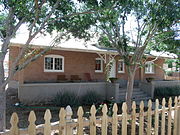 The Joseph Spinas Rental House was built in 1913 and is located in 221 Bailey St. Joseph Spinas, a prominent cattle rancher, was born in Switzerland. With his two brothers, he built one of the first irrigation ditches in the Florence area on the north side of the Gila River. Listed as Historic by the Historic District Advisory Commission.