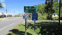 Moscow corporation limit sign with William H. Zimmer Power Station in the background.