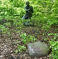A sculpture of Pan in the woods near the northern entrances.