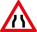 Roadway narrows from both sides ahead