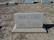 Hugh E. Laird (1882-1970) was the 12th and 15th elected Mayor of Tempe. He served two terms as such. The first term was from 1928 to 1930 and the second term was from 1948 to 1960. Laird is buried in the Sec. 2- 4 -1 of the Double Butte Cemetery.