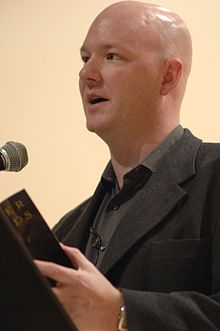York reading one of his poems in March 2007