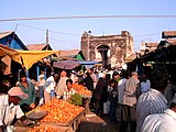 7. Mir Alam Mandi, a vegetable market in Hyderabad. (Two blokes are posing, but the rest couldn't care less.)