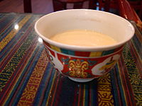 Butter tea or gur gur in the Ladakhi language, in a bowl; popular in Himalayan regions of India, particularly in Ladakh, Sikkim, and Arunachal Pradesh.