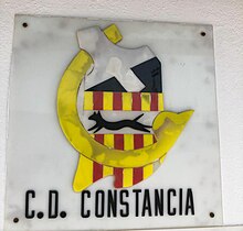 Simplified Spanish version of the logo of CE Constància at the Nou Camp d'Inca