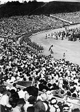 The Indian contingent marching at the 1948 London Olympics. India won the gold medal in Field Hockey