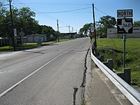 Northeast on FM 360 just north of Highway 36 in Needville