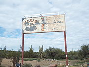 The Jack Ass Acres Service Station sign.