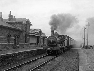 Steam train passing through Eglinton station on 1 September 1979