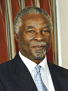 Mbeki, 61, in a portrait photograph