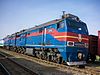 An Uzbek Railway locomotive pulling a passenger train in April 2016