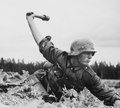 German soldier ready to throw a Stielhandgranate