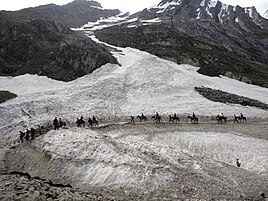 Pilgrims riding ponies on the way to the Amarnath Cave Temple