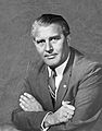 Wernher von Braun, who co-developed the V-2 rocket, the first artificial object to travel into space. Described by others as the "father of space travel",[73] the "father of rocket science",[74] or the "father of the American lunar program".