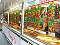 Street Vendors selling cheesesteak sandwiches, sausages and other foods lines the streets