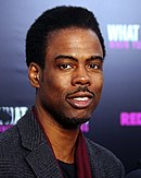 Photo of Chris Rock attending the premiere of the 2012 film What to Expect When Your Expecting.