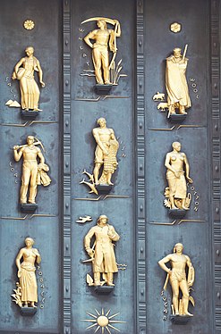 Three panels with three gold leaf figures each, set above the triple-paneled doorway to the British Empire Building that is part of Rockefeller Center, New York City. The panels were created by the artist Carl Paul Jennewein. The figures represent the major industries and the products traded within the empire: salt, coal, tobacco, wheat, fish, wool, cotton, and sugar. The radial sun symbolizes the global empire on which "the sun never sets".