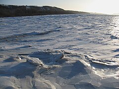 The frozen St. Lawrence River at the Île d'Orléans bridge