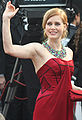 Amy Adams in a ruby red gown and bold necklace