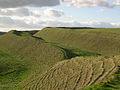 Image 63View of the ramparts of the hillfort of Maiden Castle (450 BC), as they look today (from History of England)