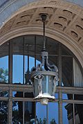 Cast bronze lamp over entrance
