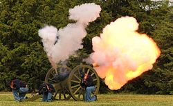 Artillerymen from Ft. Riley fire a replica of the 1855 model 3-inch cannon, 2012.