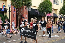 People of Pulse nightclub with plackard at Come Out with Pride Parade 2009