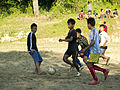 Boys playing football in Manipur.