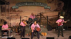 Lesa Cormier and the Sundown Playboys at the Liberty Theater in 2003. All members are wearing pink.