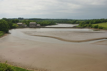 Mill and causeway dam from east end of mill pool