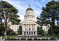 Image 9 California State Capitol Photograph credit: Andre m The California State Capitol, located in Sacramento, is the seat of the California government. The building houses the chambers of the California State Legislature, comprising the Assembly and the Senate, along with the office of the governor of California. The Neoclassical structure was designed by Reuben S. Clark and completed between 1861 and 1874. The California State Capitol Museum is housed on its grounds. More selected pictures