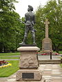 Boer War memorial statue and war memorial cross.