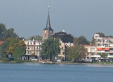 Image Hillegersberg's Hillegondakerk as seen from the Bergse Voorplas