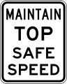 Unique speed limit sign in the United States on evacuation routes requiring drivers to maintain the maximum safe speed