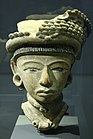Stone head of a woman from El Tajin