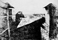 Image 12 First permanent photograph Photo credit: Nicéphore Niépce The first successful permanent photograph, created in 1826, is titled "View from the Window at Le Gras". It required an eight-hour exposure in bright sunshine and was printed on a polished pewter plate covered with a petroleum derivative called bitumen of Judea. Due to the long exposure, the buildings are illuminated by the sun from both right and left. More featured pictures