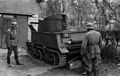 Image 23German soldiers examine an abandoned Belgian T13 Tank, 1940 (from History of Belgium)