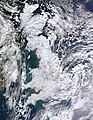 Image 2 Winter of 2009–2010 in Europe Photo: Jeff Schmaltz, MODIS Rapid Response Team, NASA A satellite photo of Great Britain and part of Ireland showing the extent of snow cover during the winter of 2009–2010, the coldest in Europe since 1981–82. Starting on 16 December 2009 a persistent weather pattern brought cold moist air from the north with systems undergoing cyclogenesis from North American storms moving across the Atlantic Ocean to the west, and saw many parts of Europe experiencing heavy snowfall and record low temperatures. More selected pictures