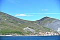 Cape Dezhnev (Chukotka, Russia) with lighthouse (Dezhnew Monument) and abandoned village Naukan