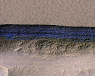 Close, color view of wall containing ice from previous image, as seen by HiRISE