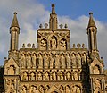 Christ the Judge, (late 20th-century) occupies the gable. Beneath are a twelve apostles and nine archangels.