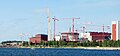 Image 67Olkiluoto 3 under construction in 2009. It was the first EPR, a modernized PWR design, to start construction. (from Nuclear power)