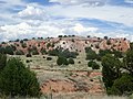 Horizontal Ancha Formation beds resting on nearly vertical Galisteo Formation beds.