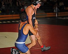 Cuesta College's Jake Lincoln wrestles Rudy Delgado of Cerritos College in 2012.