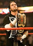 CM Punk as one half of the World Tag Team Champions